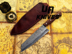 UA Knives Prisma Sanmai Damascus Steel Japanese Santoku chef knife with ergonomic rosewood handle, showcasing sharp edge and traditional design.