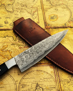 Hand forged Damascus steel chef knife by UA Knives with full tang construction and sheath, lightweight and professional.