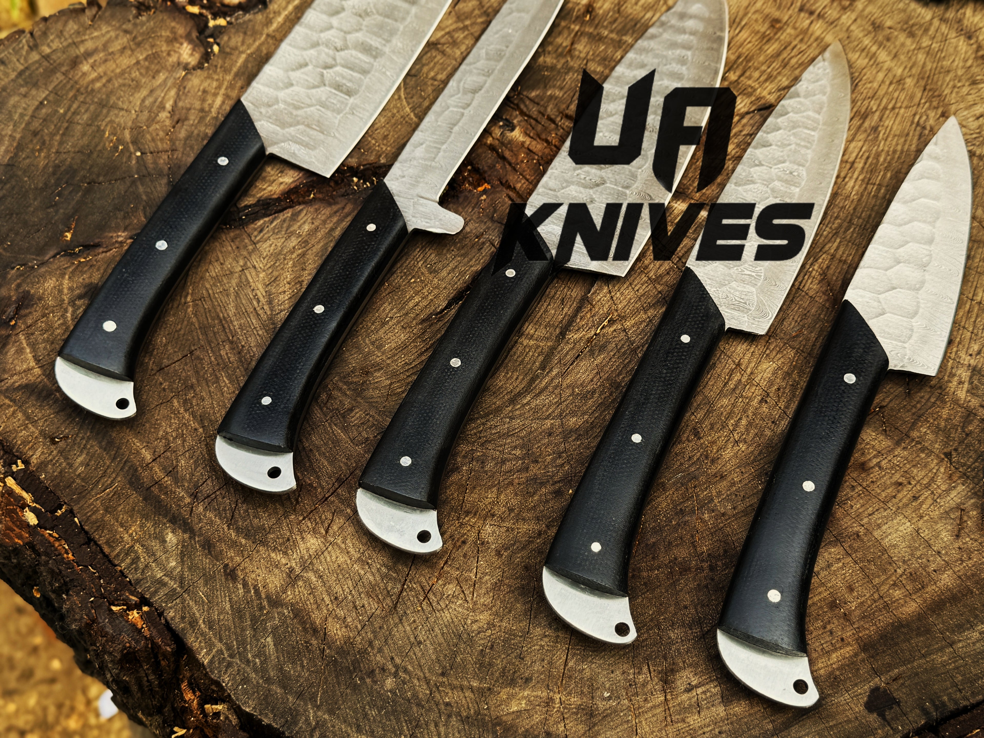 UA Knives Midnight Forge handmade Damascus steel chef set with five knives in a genuine leather bag, full tang design for BBQ cooking.