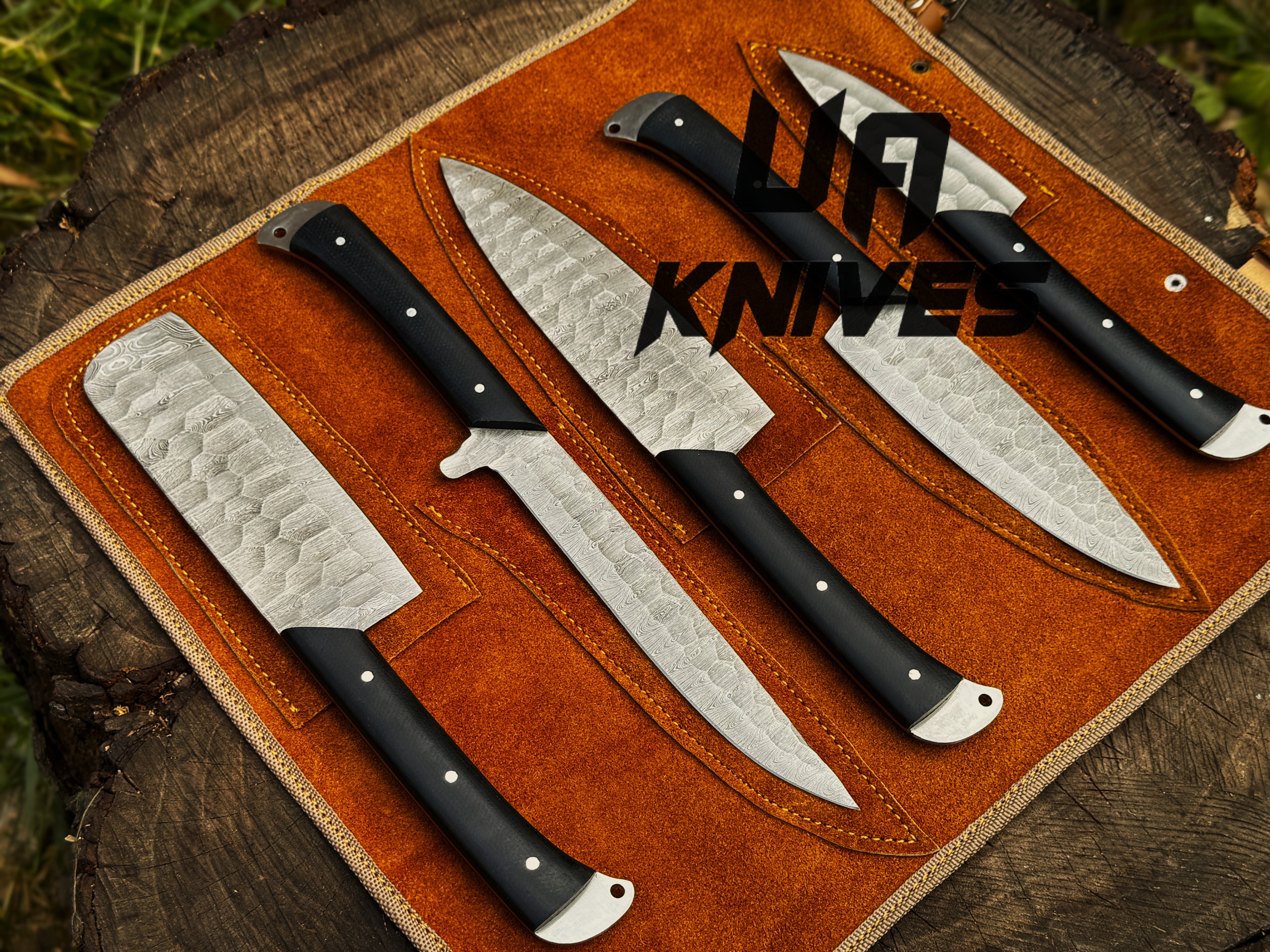 UA Knives Midnight Forge handmade Damascus steel chef set with five knives in a genuine leather bag, perfect for grilling and cooking.