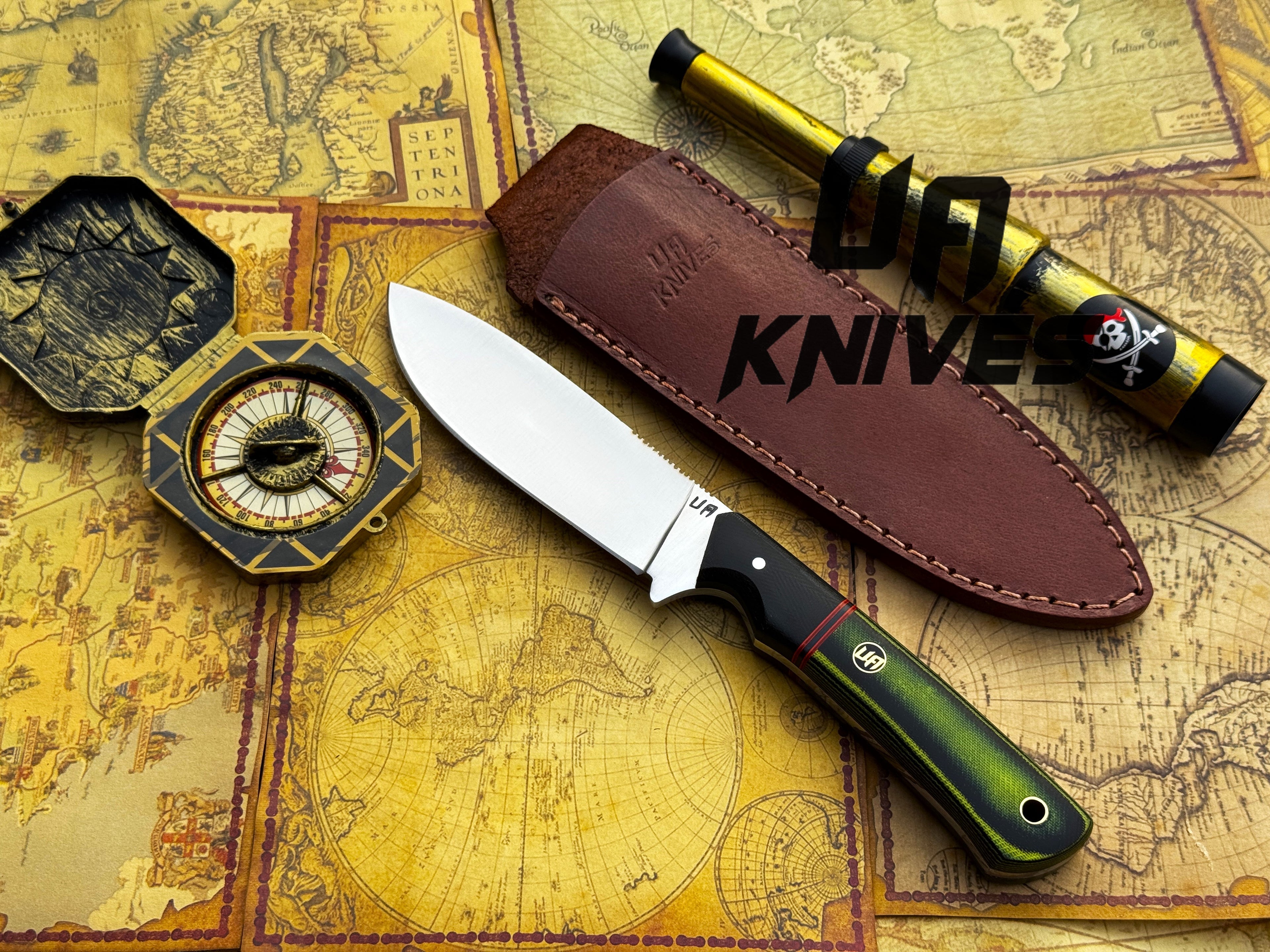 UA Forest Ranger hunting knife with an 11-inch hand-forged blade and G10 Micarta handle, designed for camping and outdoor use.
