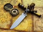UA Knives Camp Quest handmade 12-inch hunting camping knife with sheath, featuring a sturdy blade and leather sheath for outdoor use.