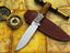 UA Knives Camp Quest handmade 12-inch camping hunting knife with sheath, featuring a sturdy blade and leather handle for outdoor use.