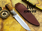 Handmade UA Camp Quest 12-inch camping and hunting knife with sheath, featuring a sturdy blade and ergonomic handle.