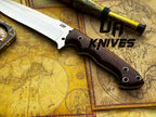 UA Knives Bushcraft Pro hunting knife with a 12-inch hand-forged full tang blade and durable handle for outdoor use.