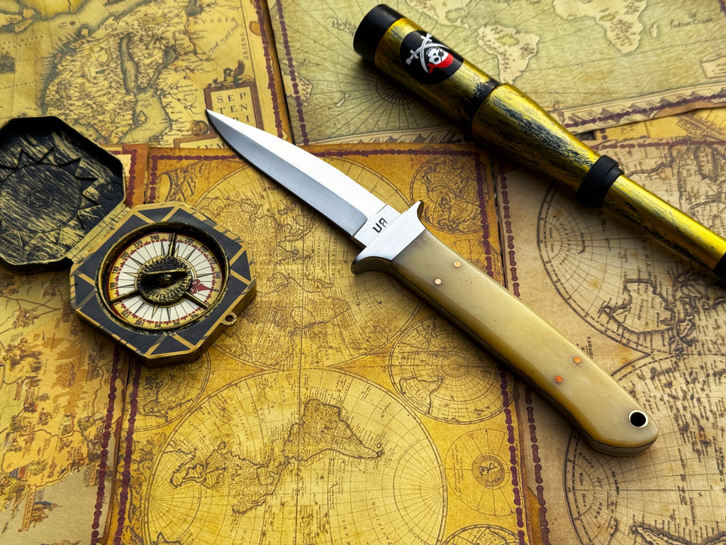 UA Iron Fang stainless steel camping knife with a textured handle and sharp blade, perfect for outdoor camping and survival tasks.