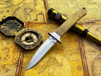 UA Iron Fang stainless steel camping knife with a textured handle and sharp blade, ideal for outdoor camping and survival tasks.