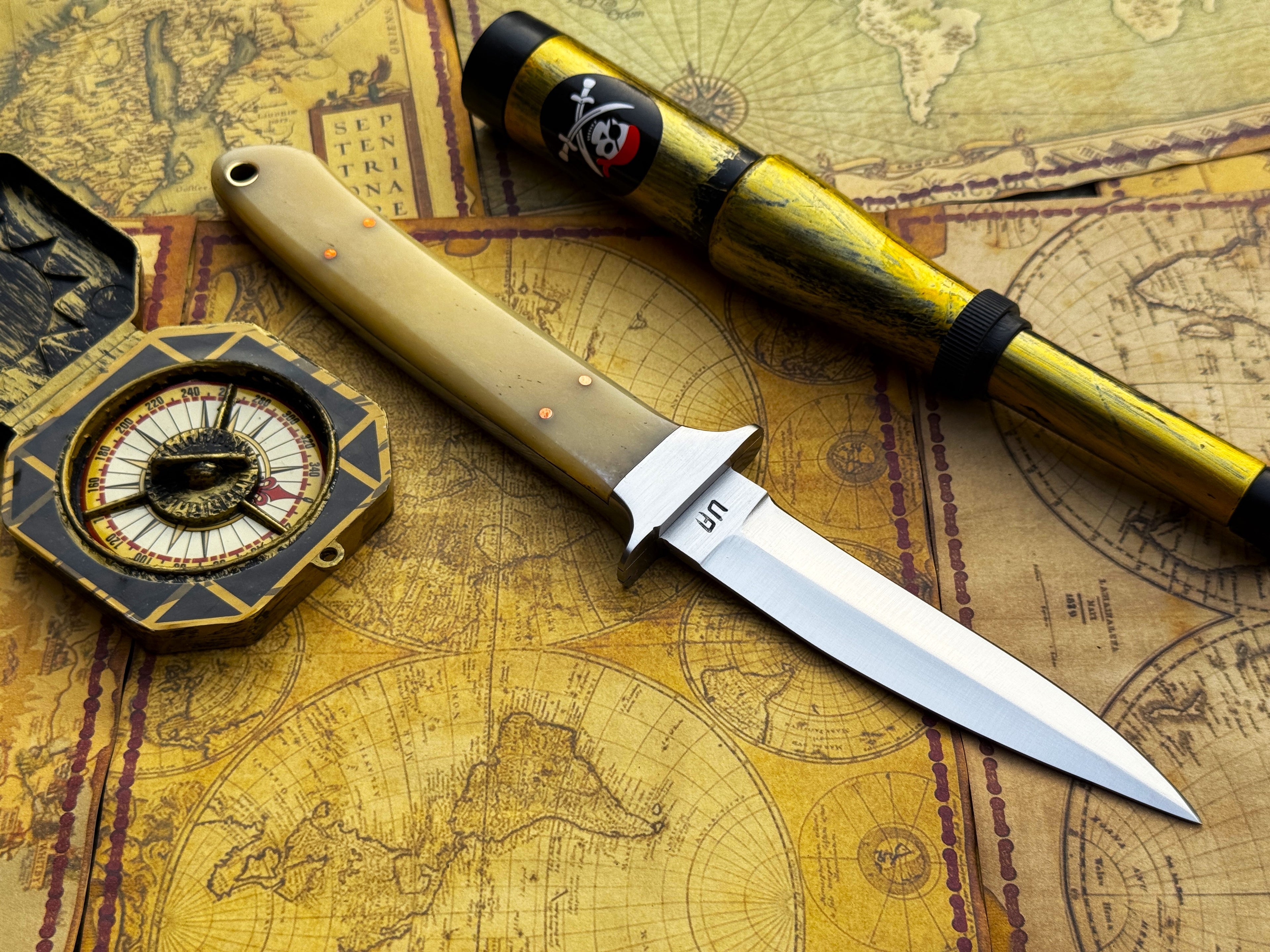 UA Iron Fang stainless steel camping knife with a textured handle and sharp blade, ideal for outdoor camping and survival tasks.