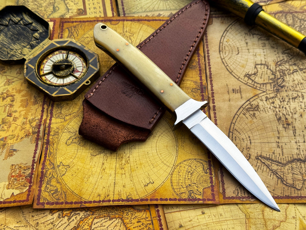 UA Iron Fang stainless steel camping knife with a black handle, suitable for outdoor camping and survival tasks.