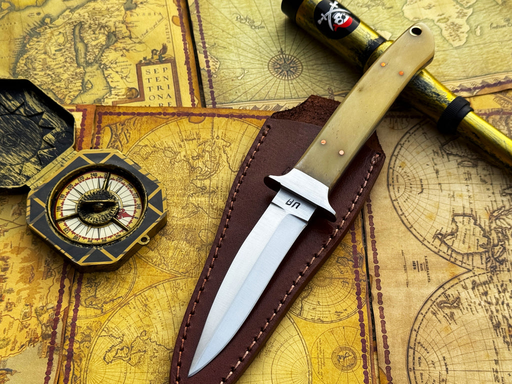 UA Iron Fang stainless steel camping knife with a textured handle and sharp blade, ideal for outdoor survival and camping activities.