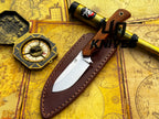 UA Cobra Strike camping knife by UA Knives with handmade lightweight design and protective sheath, shown with blade and handle visible.