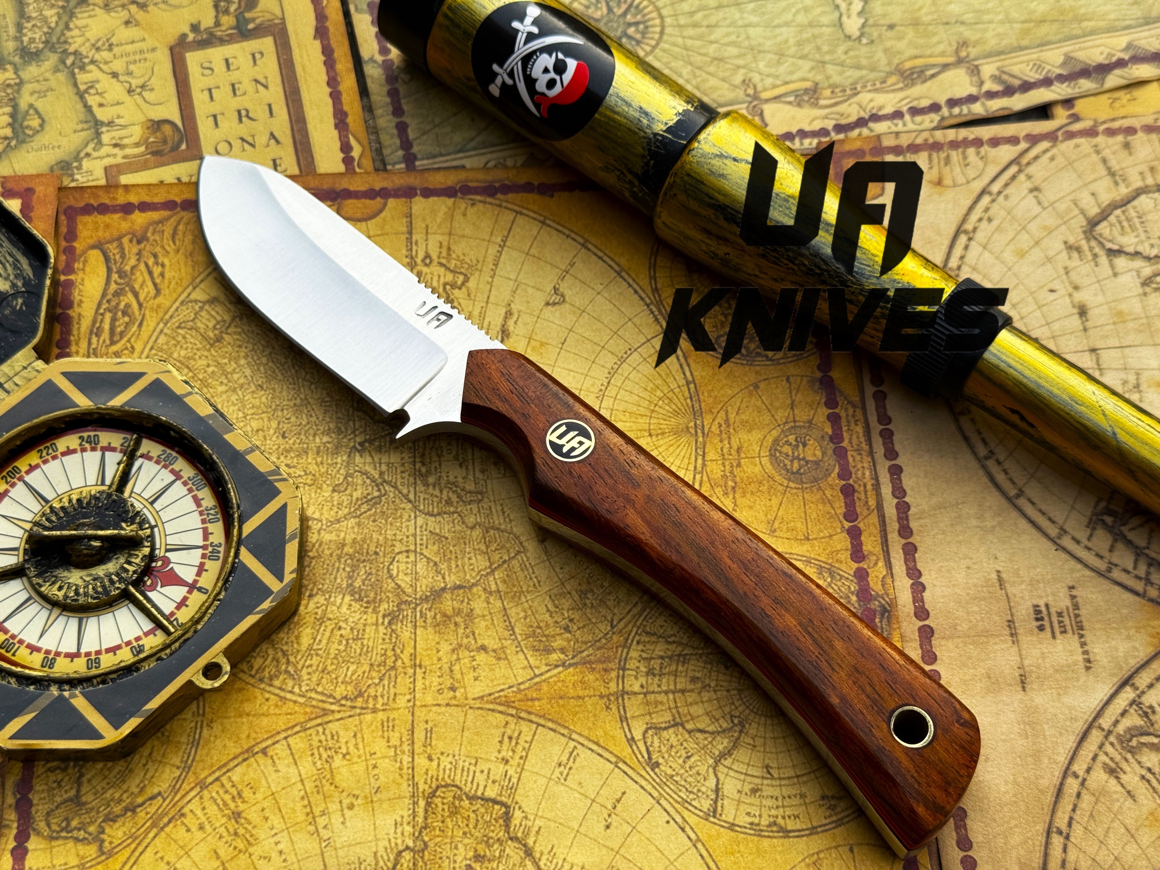 UA Cobra Strike camping knife by UA Knives with a leather sheath, lightweight and handmade for outdoor camping and survival use.