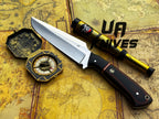UA Dragons Tooth handmade Bowie hunting knife with sheath, featuring a detailed blade and sturdy handle for outdoor use