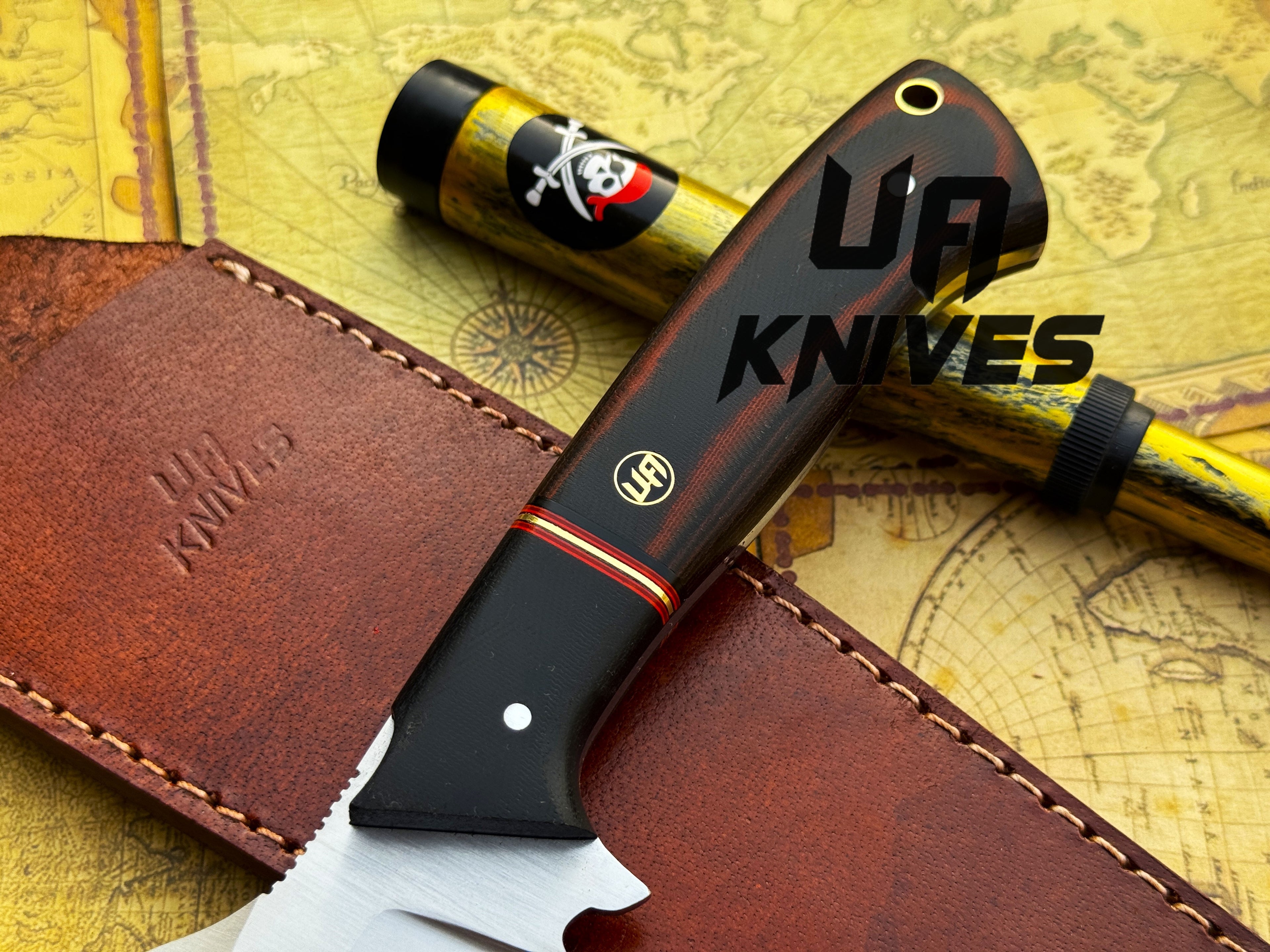 UA Knives Dragons Tooth handmade Bowie hunting knife with sheath, featuring a detailed blade and leather handle.