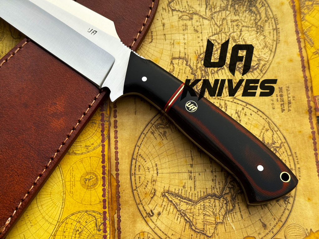 UA Dragons Tooth handmade Bowie hunting knife with leather sheath, featuring a detailed dragon tooth design and sturdy handle.