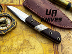 UA Silver Myst stainless steel camping skinning knife with sheath, designed for outdoor hunting and field dressing tasks.