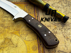 UA Knives Bear Claw hunting knife with hand-forged blade and G10 Micarta handle, displayed on a neutral background.