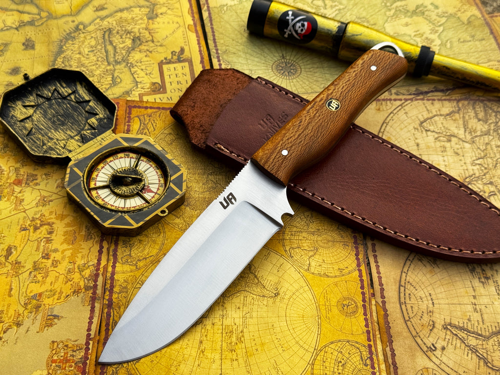 UA Knives Nature Nook hand-forged stainless steel hunting knife with a leather handle and outdoor-ready blade.