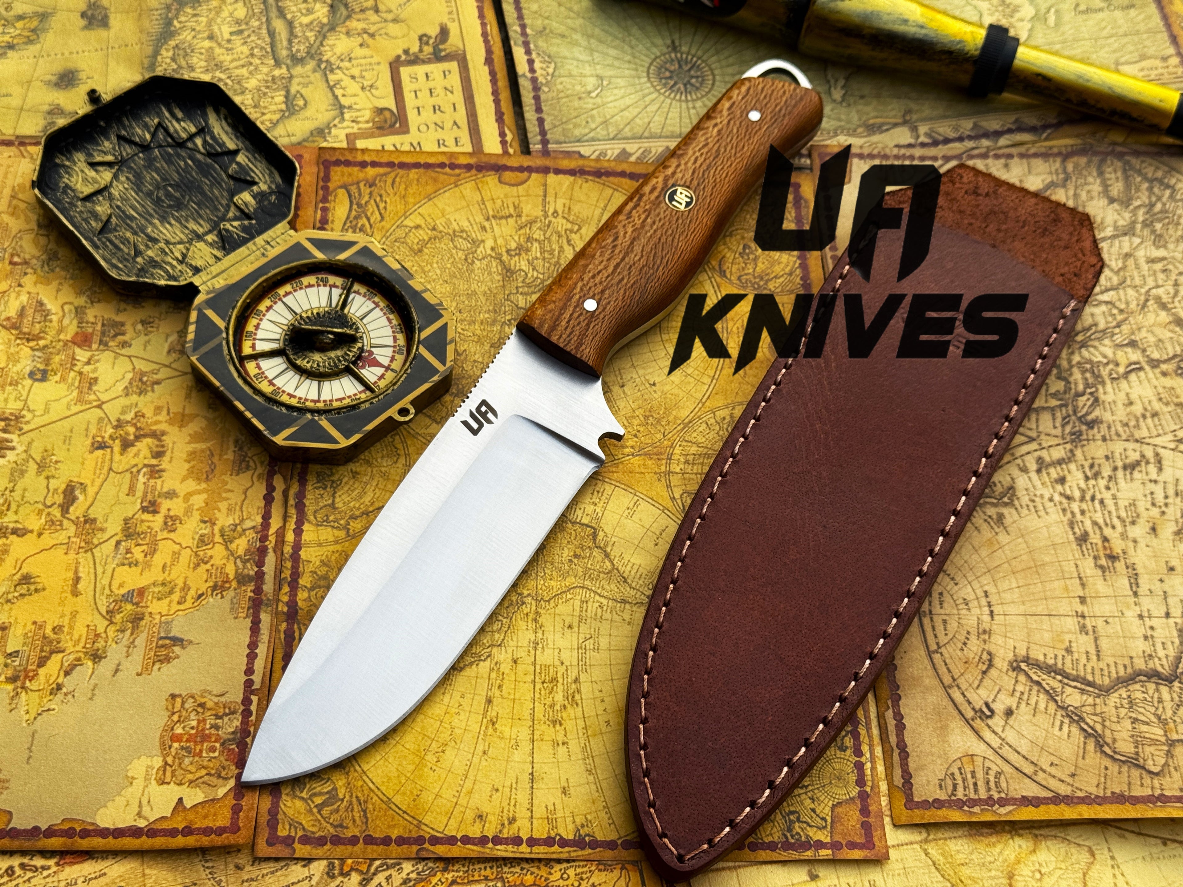 UA Knives Nature Nook hunting knife with hand-forged stainless steel blade and wooden handle, suitable for outdoor hunting tasks.