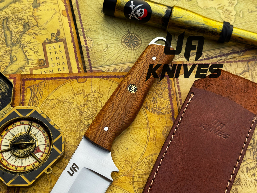 UA Knives Nature Nook hunting knife with hand-forged stainless steel blade and ergonomic handle, ideal for outdoor hunting activities.