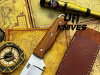 UA Knives Nature Nook hunting knife with hand-forged stainless steel blade and ergonomic handle, ideal for outdoor hunting activities.