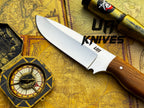 UA Knives UA Nature Nook hand-forged stainless steel hunting knife with a textured handle and sharp blade.