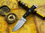 UA Knives Silver Myst camping hunting knife with hand-forged 12C27 steel and sheath, featuring a sharp blade and durable handle.