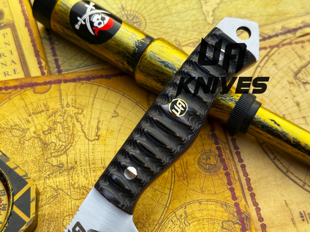 UA Silver Myst hand-forged 12C27 camping and hunting knife with sheath, featuring a sleek blade and ergonomic handle.