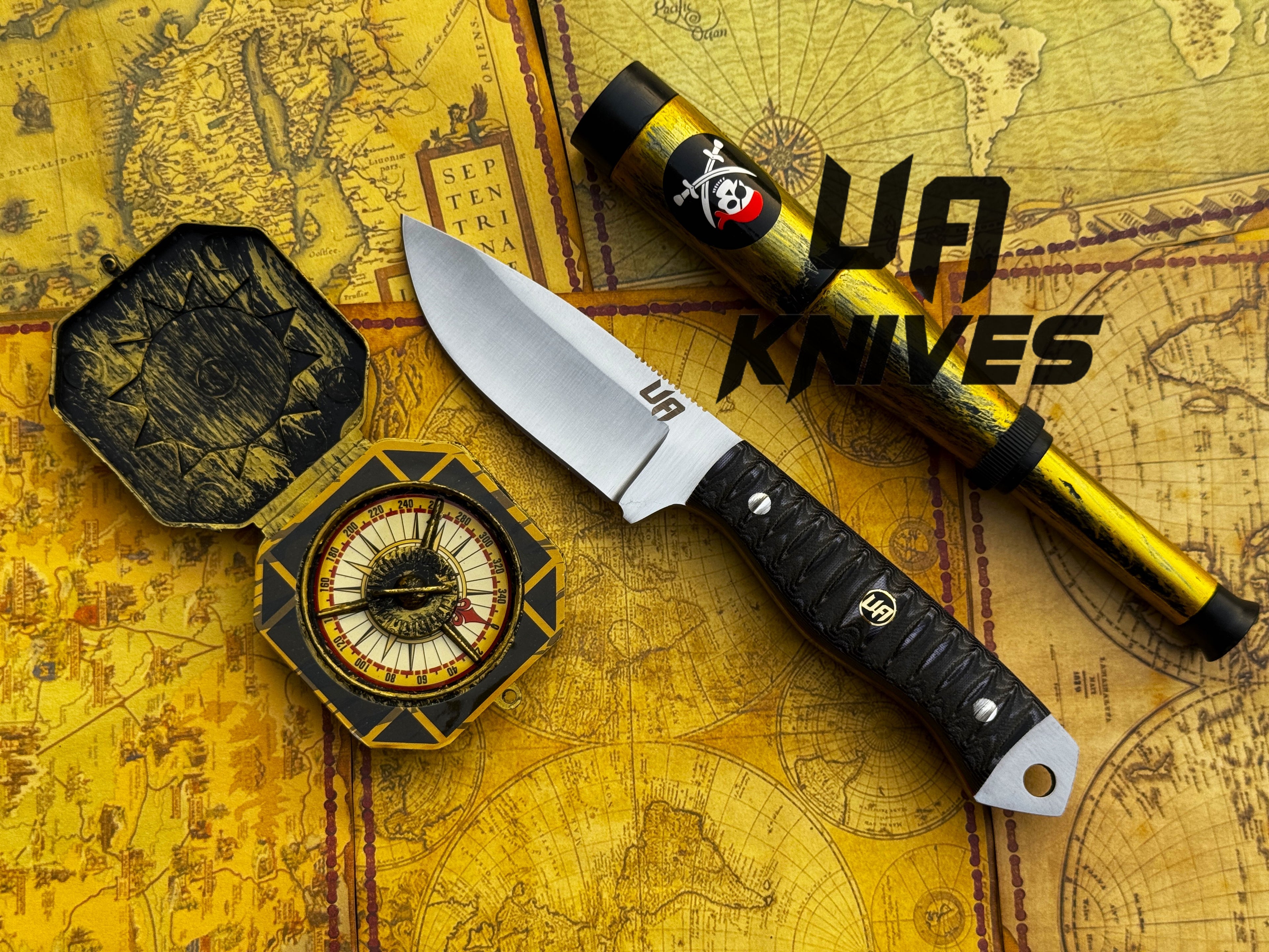 UA Silver Myst hunting knife by UA Knives, hand-forged 12C27 steel with a leather sheath, shown on a rustic surface.
