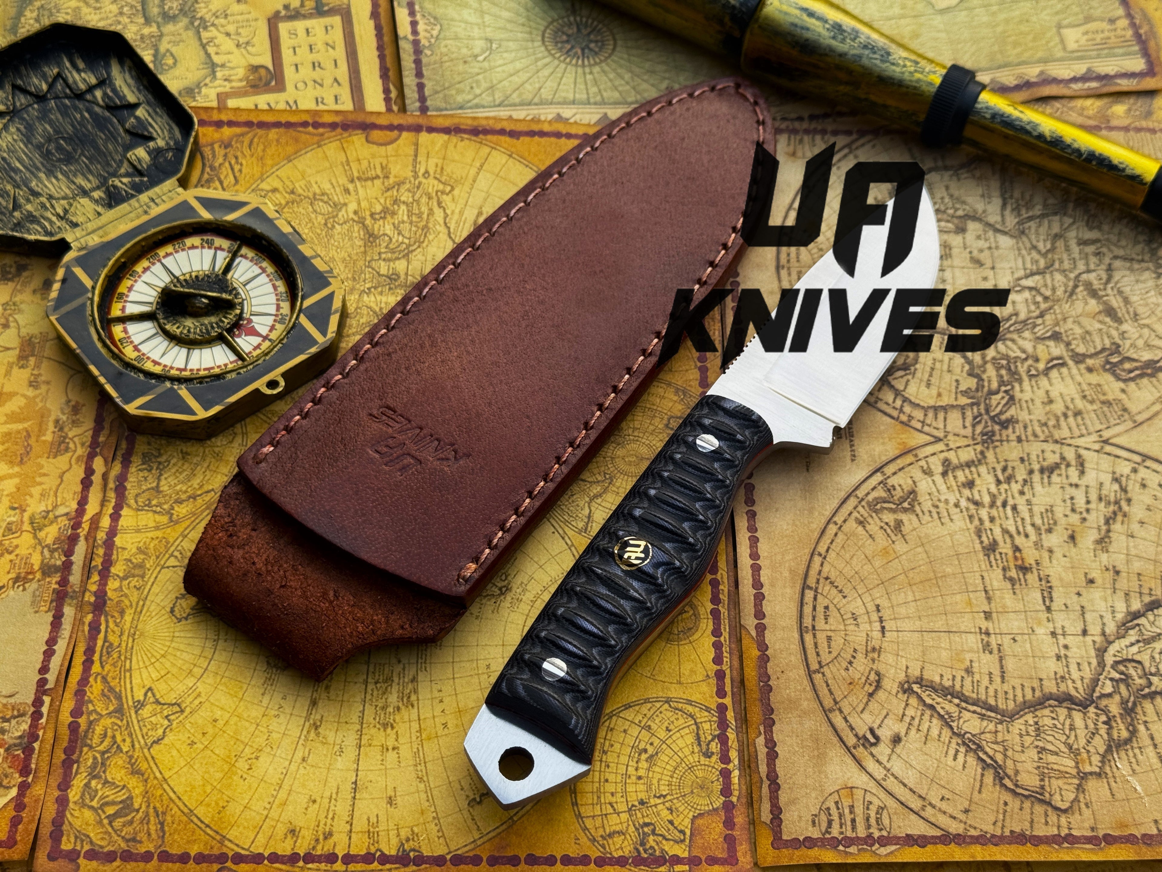 UA Knives Silver Myst camping knife with hand-forged 12C27 blade and sheath, ideal for hunting and outdoor tasks.
