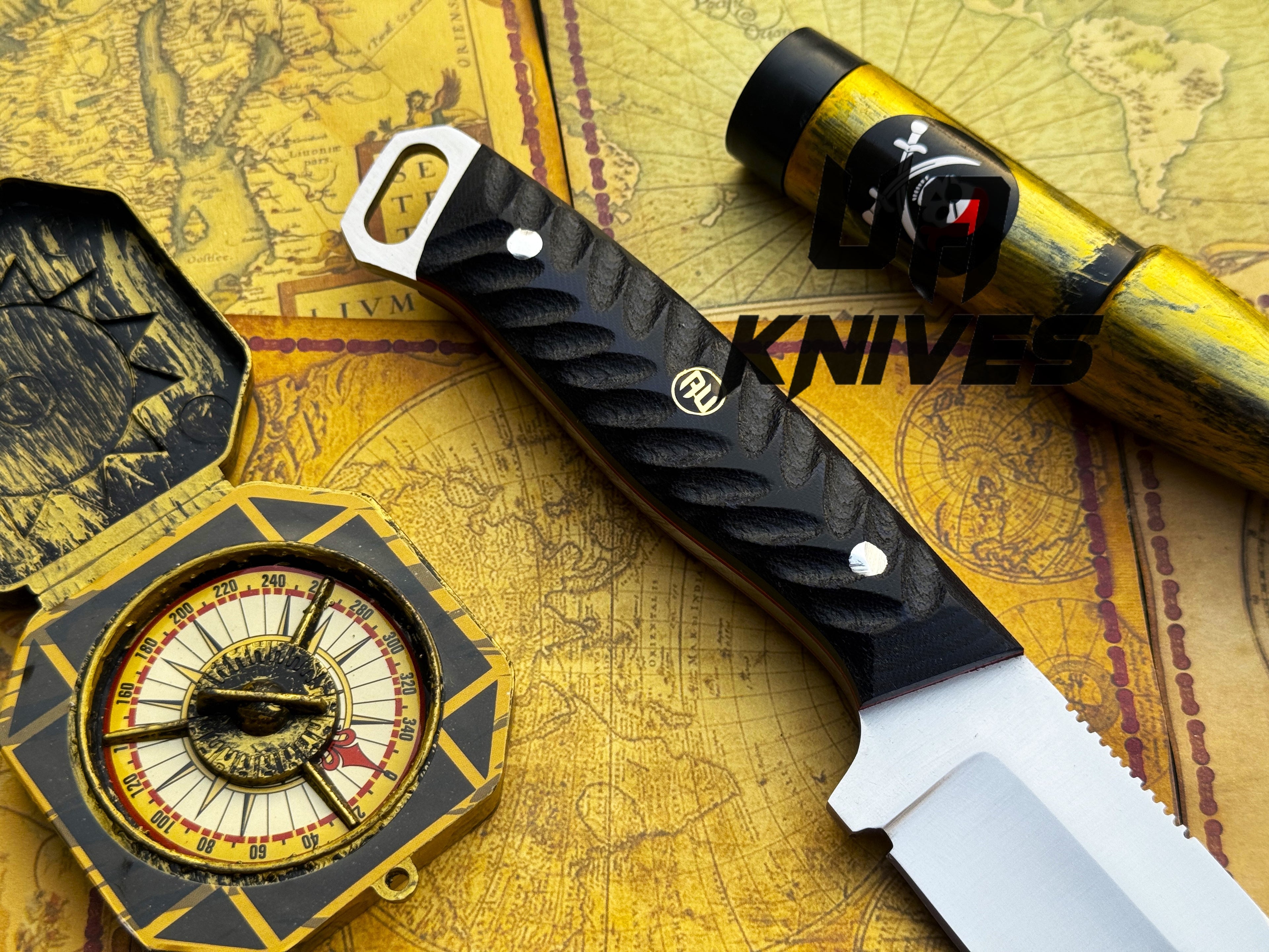 UA Night Stalker hunting knife with 12C27 stainless steel blade and black handle, displayed on a wooden surface.