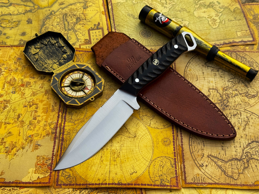 UA Knives Night Stalker hunting knife with a 12C27 stainless steel blade and black handle, shown on a plain background