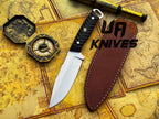 UA Night Stalker hunting knife with 12C27 stainless steel blade and ergonomic handle, ideal for outdoor and hunting use.