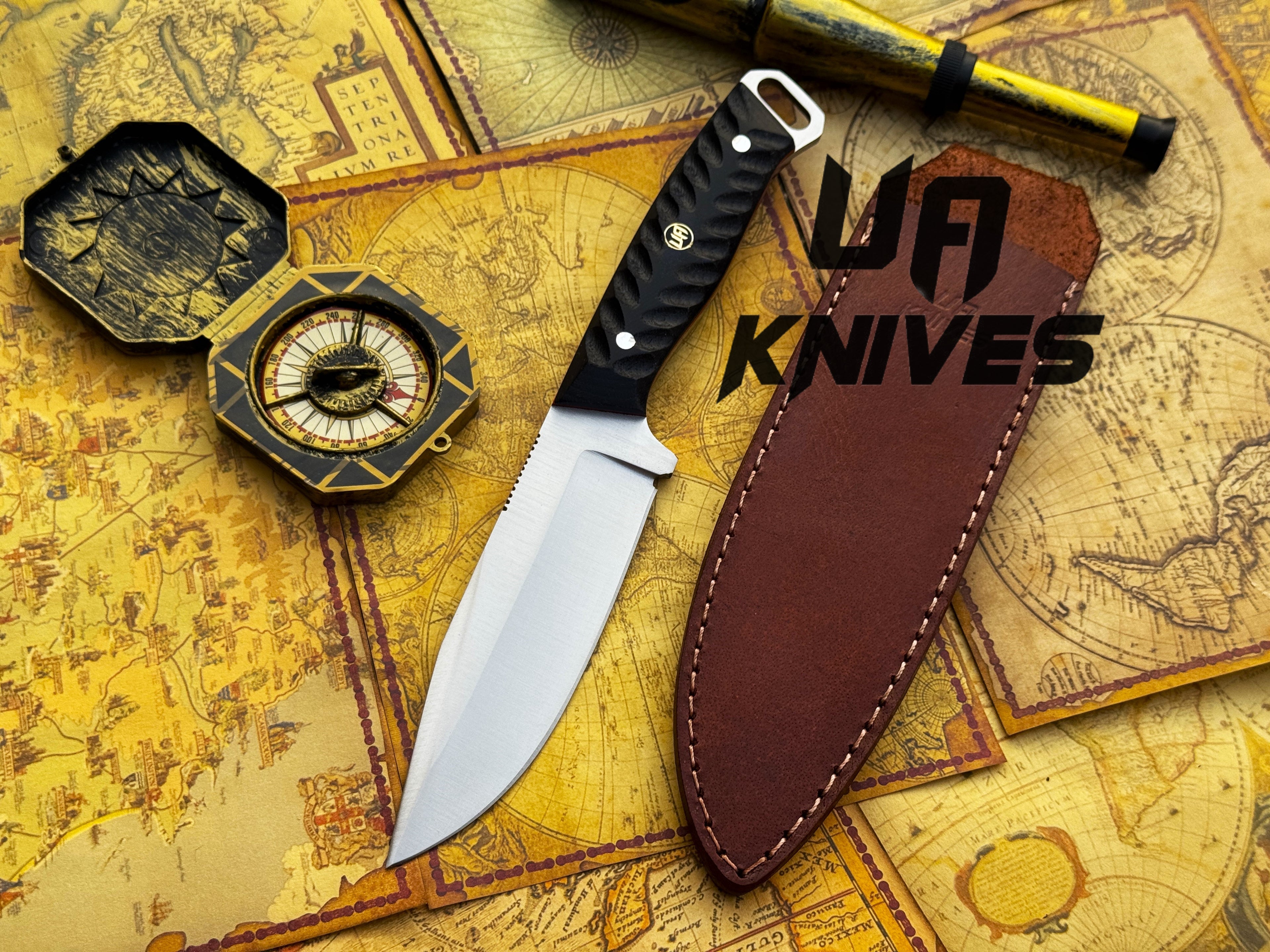 UA Night Stalker hunting knife with 12C27 stainless steel blade and ergonomic handle, ideal for outdoor and hunting use.