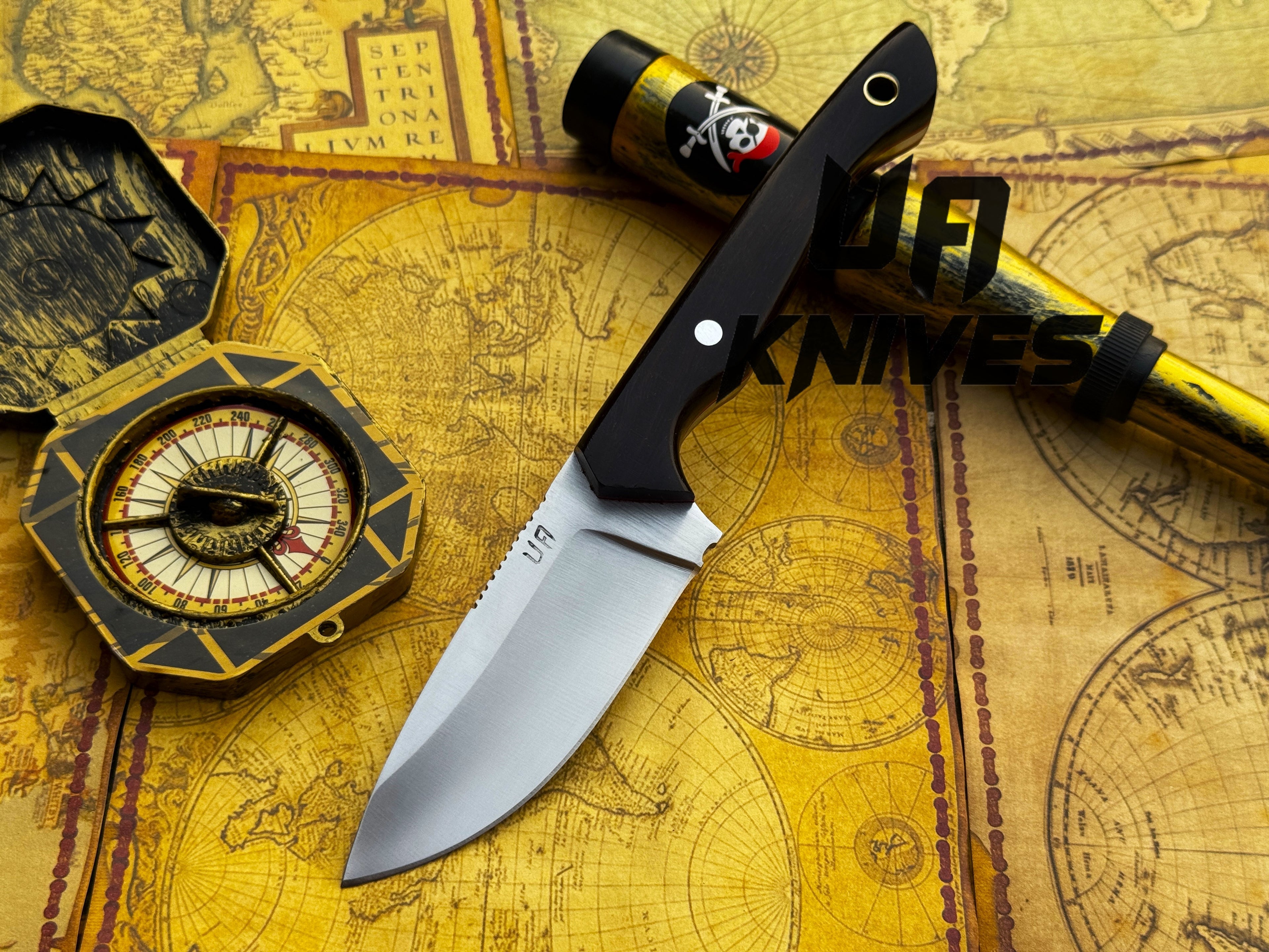 UA Oakheart handmade survival and bushcraft camping knife with wooden handle and sharp blade, displayed on a wooden surface.