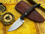 UA Oakheart handmade camping and survival knife by UA Knives, featuring a durable blade and ergonomic handle for outdoor bushcraft.