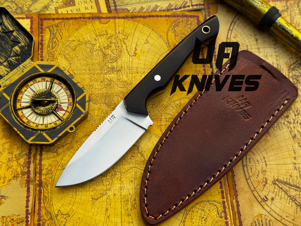 UA Oakheart handmade survival and bushcraft camping knife with a wooden handle and sharp blade, ideal for outdoor camping and survival tasks.