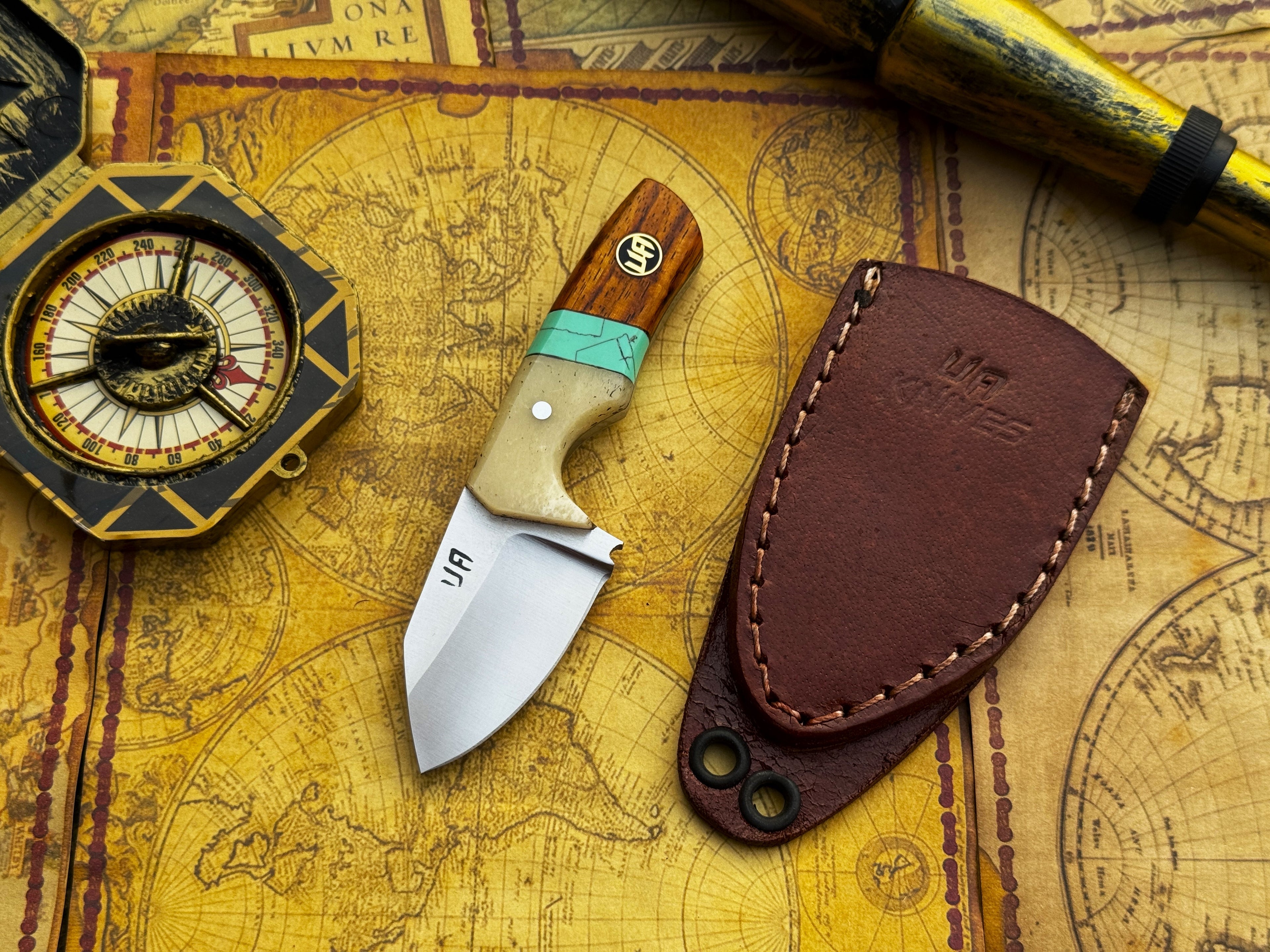 Handmade UA Pocket Protector EDC Utility Knife with a sleek handle and sharp blade, designed for everyday carry and utility tasks.
