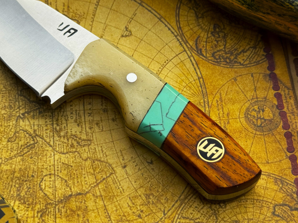 Handmade UA Pocket Protector EDC Utility Knife with black handle and stainless steel blade, designed for everyday carry and utility.