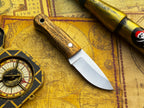 UA Devil Dust handmade EDC utility knife with a sleek blade and ergonomic handle, designed for everyday carry.