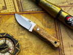 Handmade UA Devil Dust EDC Utility Knife with textured handle and sharp blade, designed for everyday carry and versatile use.