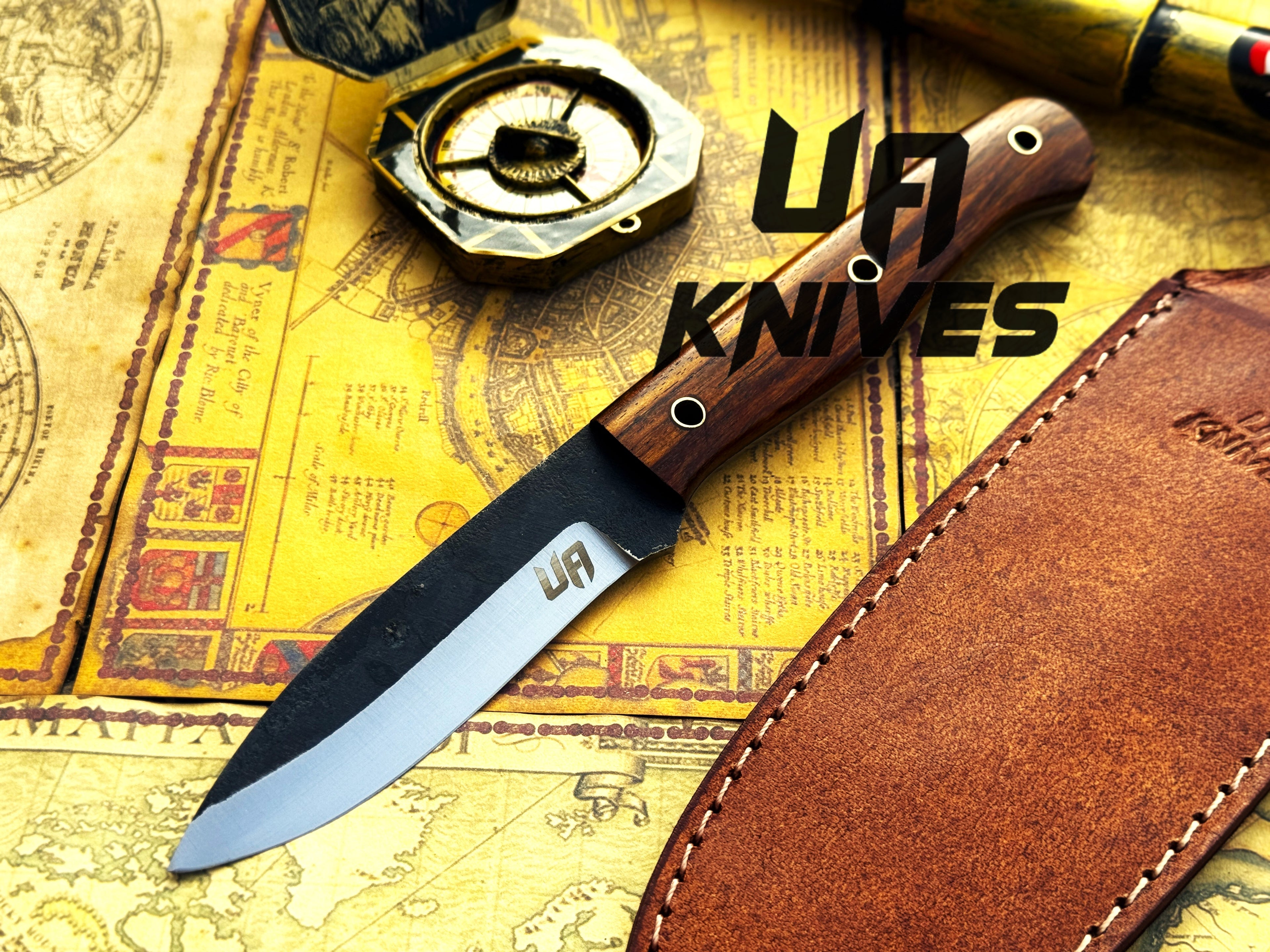 UA Knives True Guide Scandinavian bushcraft camping knife with hand-forged blade and ergonomic rosewood handle.