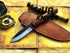 UA Knives True Guide camping knife with hand-forged Scandinavian blade and ergonomic rosewood handle for bushcraft and camping.