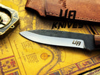 UA Knives True Guide camping knife with hand-forged Scandinavian blade and ergonomic rosewood handle, ideal for bushcraft camping.