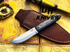 UA Eagle Eye hand-forged Pakku style stainless steel camping knife with full tang and sheath, ideal for outdoor survival and camping.
