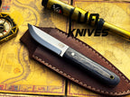 UA Knives Eagle Eye camping knife with full tang stainless steel blade and sheath, designed for outdoor and EDC use.