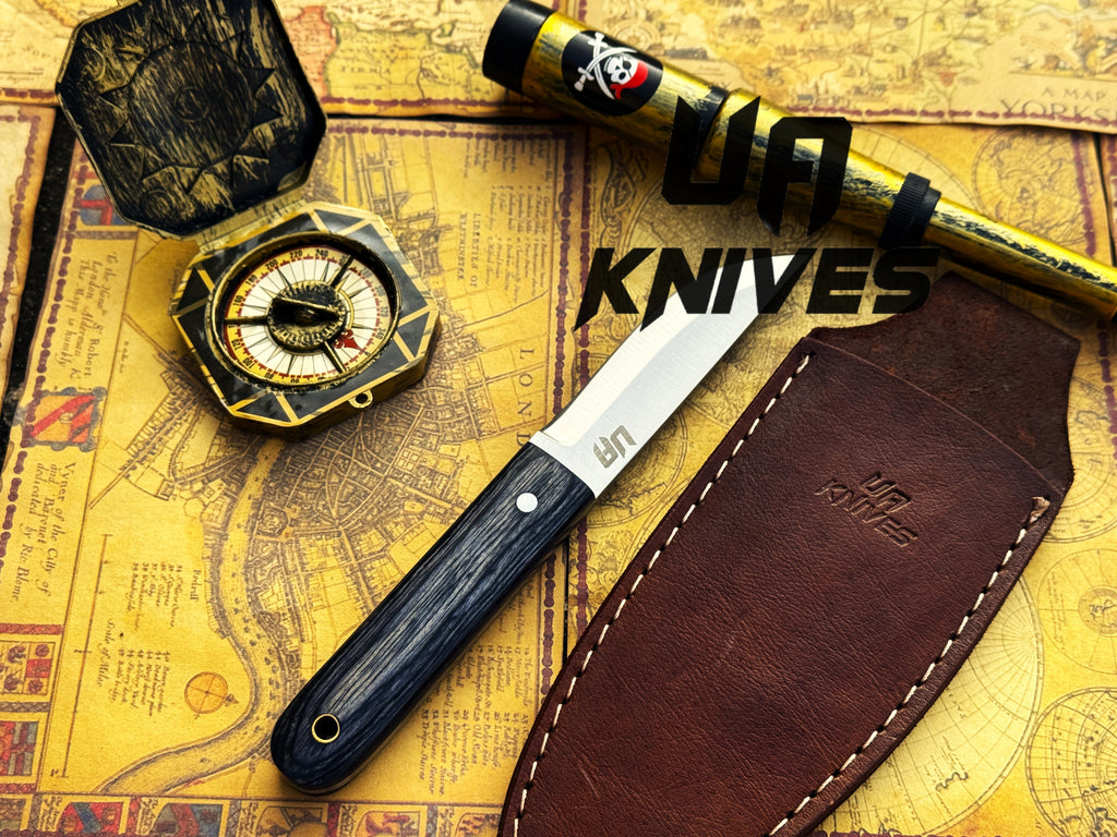 UA Knives Eagle Eye camping knife featuring hand-forged Pakku style full tang stainless steel blade with sheath.