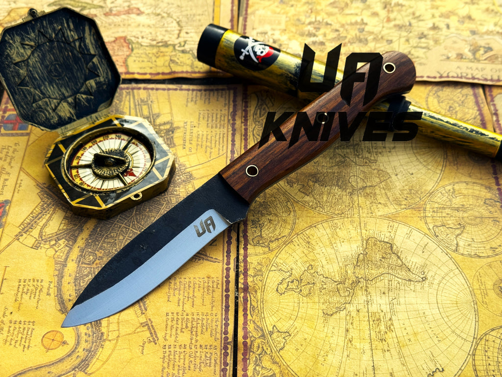 UA Knives True Guide Scandinavian camping knife with hand-forged blade and ergonomic rosewood handle, ideal for outdoor bushcraft.