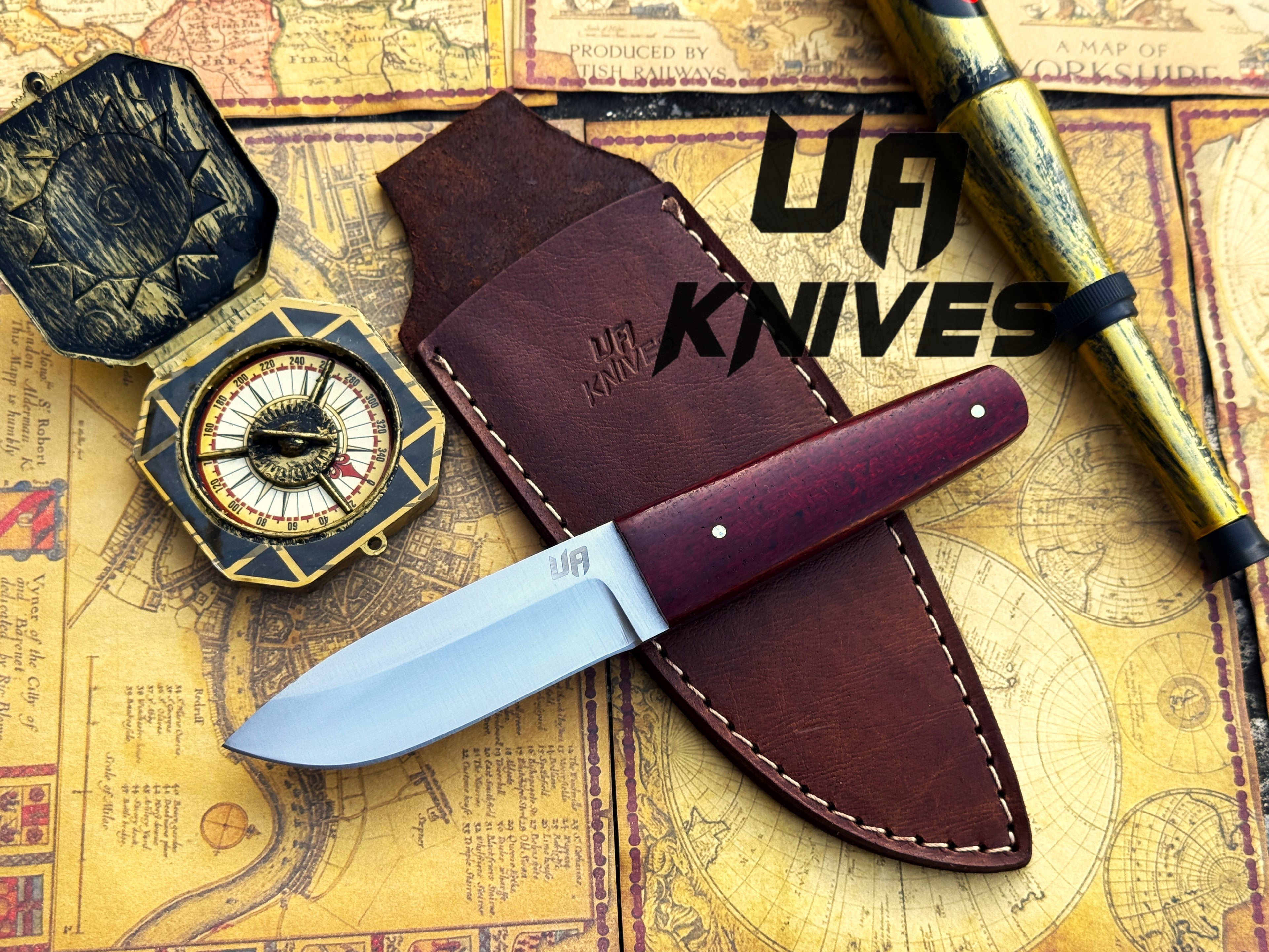 UA Horizon camping knife with handmade 12C27 stainless steel blade and G10 Micarta handle, designed for outdoor use.