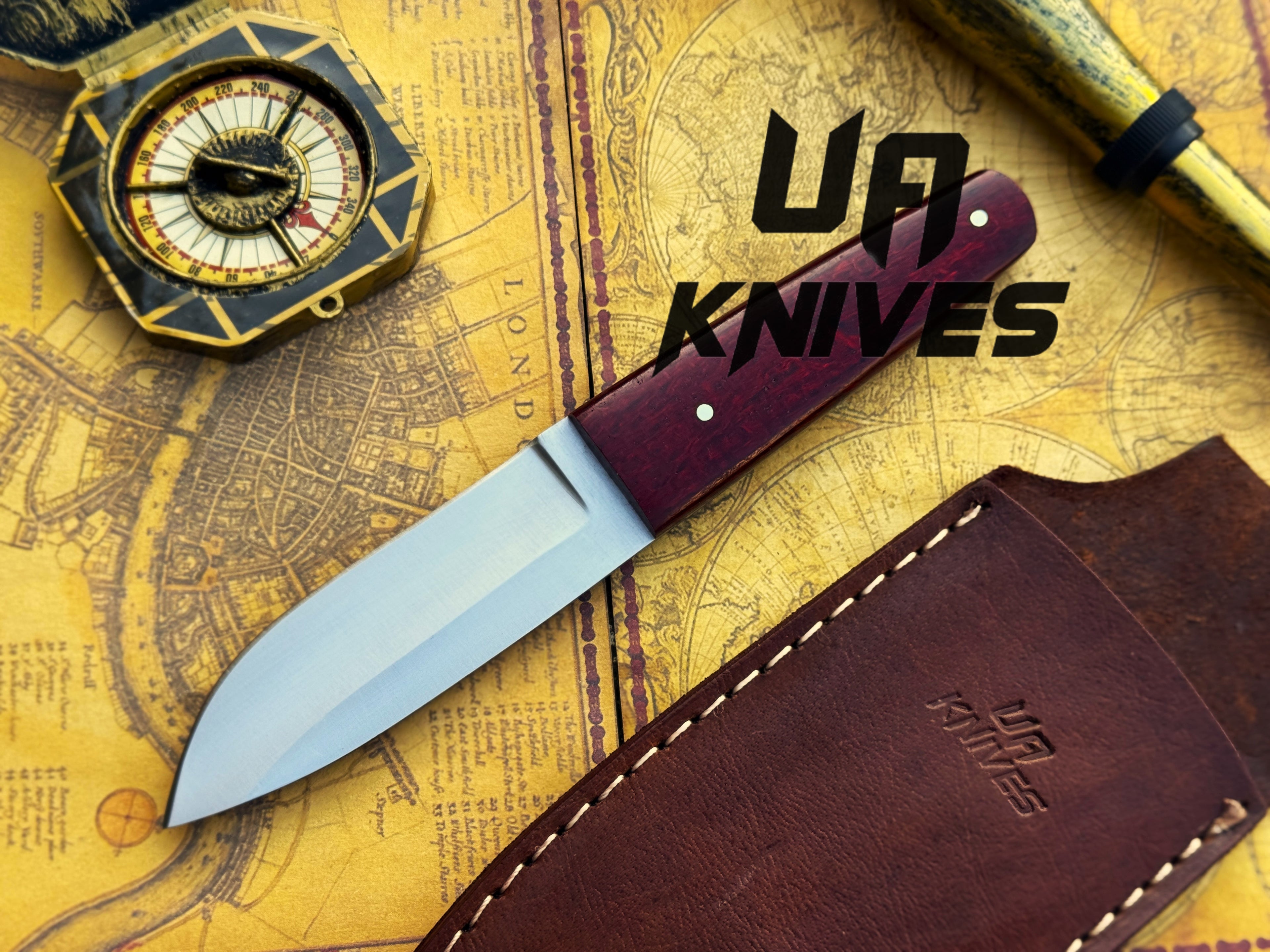 UA Horizon camping knife with G10 Micarta handle, handmade 12C27 stainless steel skinner knife by UA Knives, shown in outdoor setting.